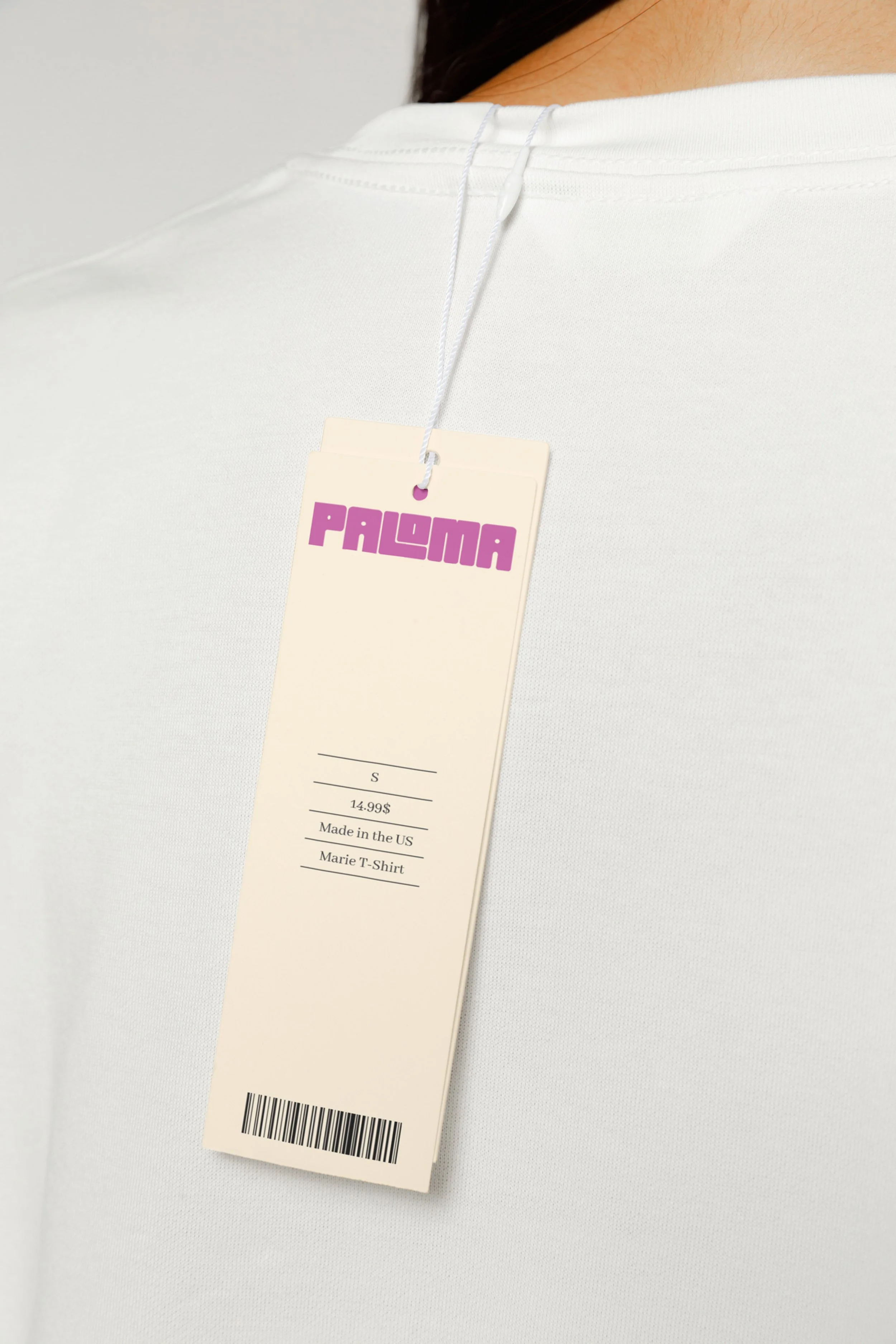 Paloma swing tag on a garment