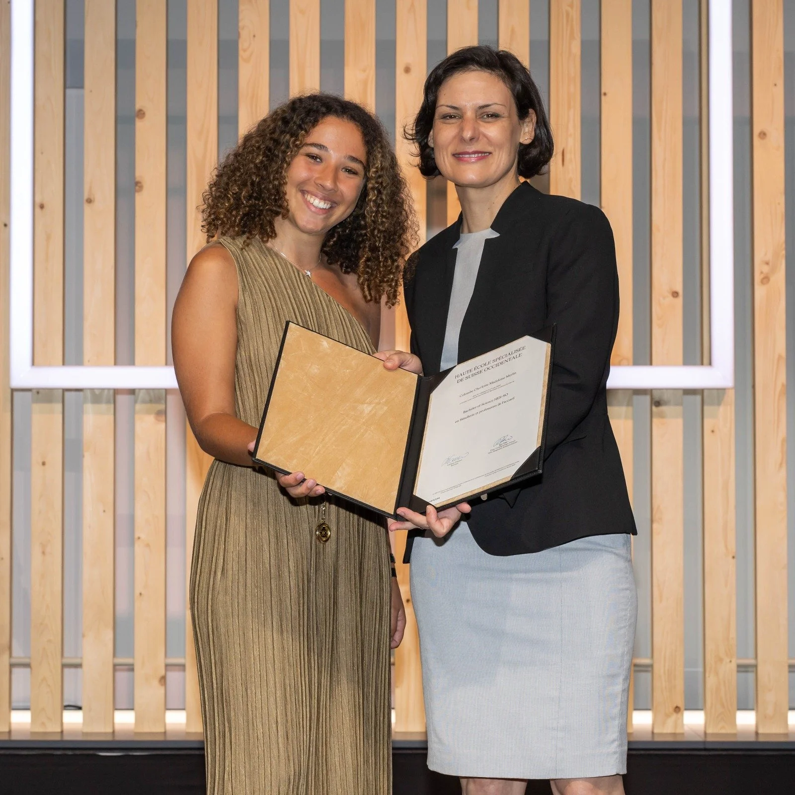 Colombe receiving her EHL diploma