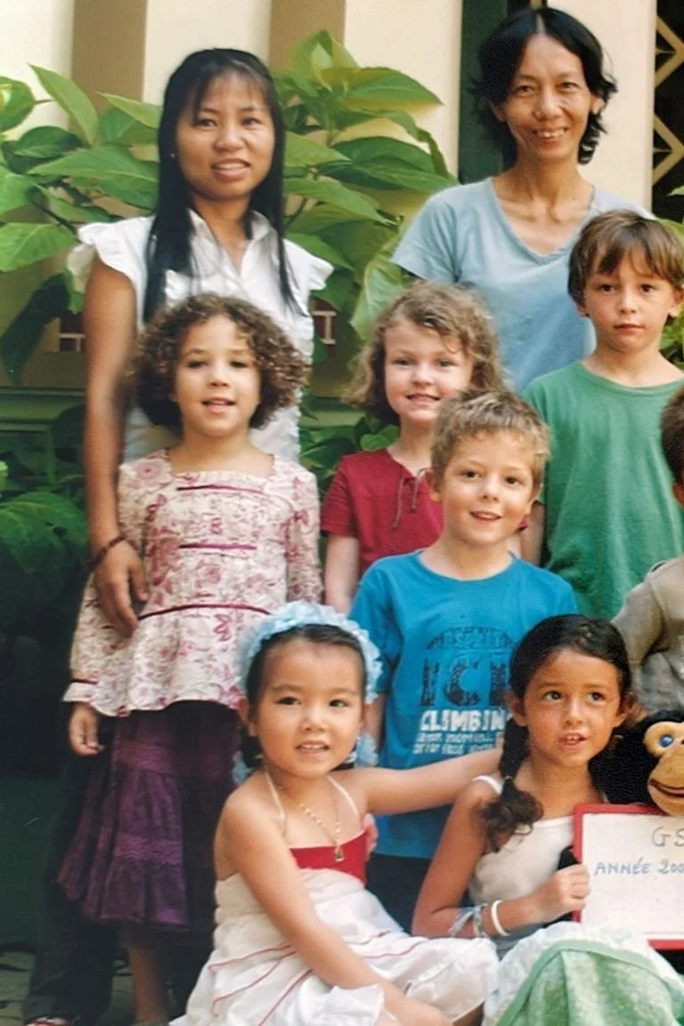Colombe as a child at school in Vietnam
